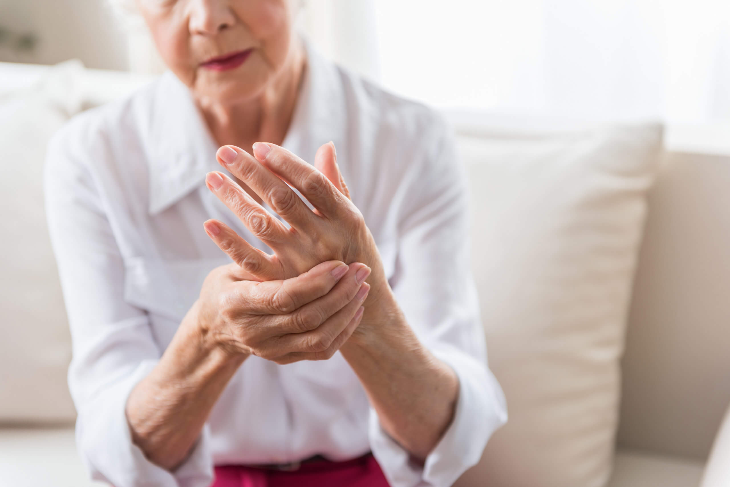An old man with arthritis pain